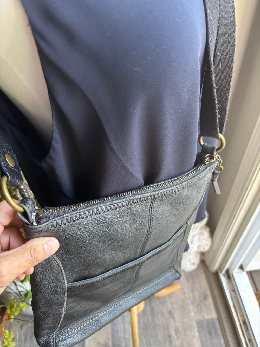 The Sak Black Leather Pebbled Crossbody with Gold Accents